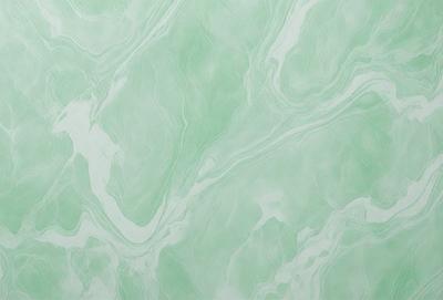 The primary subject of the image is a green and white marble wall. The setting is a room with a green and white marble wall as the main focus. The visual style is a photo of the marble wall. The dominant colors are green and white, creating a calm and serene atmosphere.