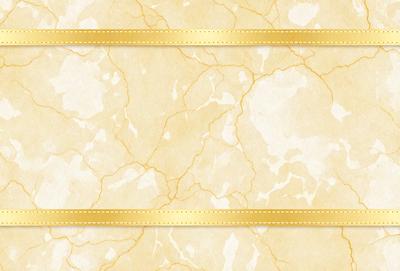 The primary subject of the image is a yellow and white marbled paper with a gold border. The setting is a wall, and the visual style is a patterned paper. The colors and mood of the image are warm and inviting, with the gold border adding a touch of elegance.