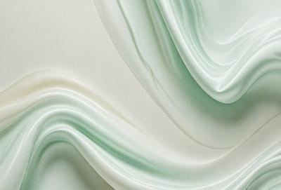 The primary subject of the image is a large, curved, and textured surface, which appears to be a white, green, and blue wall. The setting is a room with a white background, and the visual style is a combination of photo and digital art. The colors and mood of the image are predominantly white, green, and blue, creating a calm and soothing atmosphere.