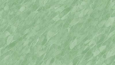 The primary subject of the image is a green wall with a pattern of leaves. The setting is a room with a green wall, and the visual style is a close-up of the wall. The dominant colors are green and brown, creating a natural and earthy atmosphere.