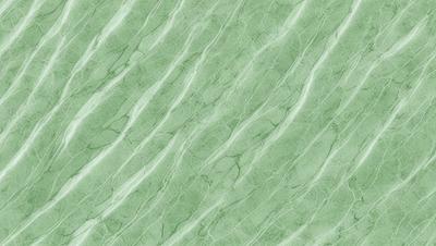 The image features a green, textured surface with a patterned texture. The primary subject is the green surface, which appears to be a wall or a piece of artwork. The setting is indoors, and the visual style is a close-up of the green surface. The colors and mood of the image are predominantly green, creating a calm and soothing atmosphere.