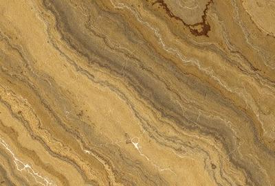 The primary subject of the image is a marble countertop with a unique, swirling pattern. The setting is a kitchen or bathroom, as the countertop is a prominent feature in the scene. The visual style is a close-up of the marble countertop, showcasing its intricate design. The colors and mood of the image are warm and inviting, with the marble countertop serving as a focal point in the space.