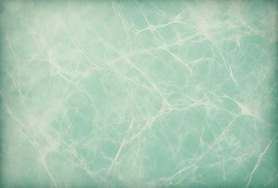 The primary subject of the image is a close-up of a white and blue wall with a pattern of white and blue swirls. The setting is a room with a blue-green color scheme. The visual style is a combination of a photo and a digital art, illustration, or drawing. The dominant colors are white, blue, and green, creating a calm and soothing atmosphere.