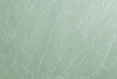 The primary subject of the image is a close-up of a marble wall. The setting is a room with a green marble wall, which serves as the background. The visual style is a photo, capturing the intricate details of the marble wall. The colors and mood of the image are predominantly green, giving it a natural and elegant appearance.