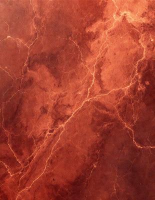 The primary subject of the image is a close-up of a maroon-colored wall with a textured surface. The setting is indoors, likely in a room or a building. The visual style appears to be a photo, as it captures the intricate details of the wall's texture. The colors and mood of the image are warm and inviting, with the maroon color evoking a sense of comfort and coziness.
