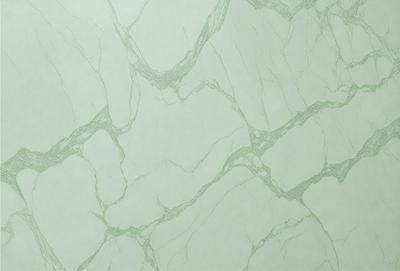 The image features a green marble wall with a pattern of white and green swirls. The wall appears to be a part of a bathroom, as it is described as a "bathroom wall." The marble pattern creates a visually appealing and luxurious atmosphere.