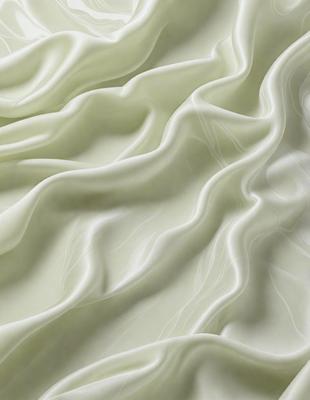 The primary subject of the image is a white sheet of fabric, which is the main object, scene, or focus of the image. The setting or background is a white sheet of fabric, and the visual style is a photo. The colors and mood of the image are predominantly white, giving it a clean and minimalist appearance.