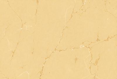 The primary subject of the image is a yellow marble wall. The setting is a room with a yellow marble wall, which serves as the background. The visual style is a close-up of the yellow marble wall, showcasing its texture and color. The dominant colors are yellow and beige, creating a warm and inviting atmosphere.