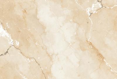 The primary subject of the image is a marble wall with a white and brown color scheme. The setting is a room with a marble floor, and the visual style is a close-up of the marble wall. The colors and mood of the image are warm and natural, with the marble wall and floor creating a sense of elegance and sophistication.