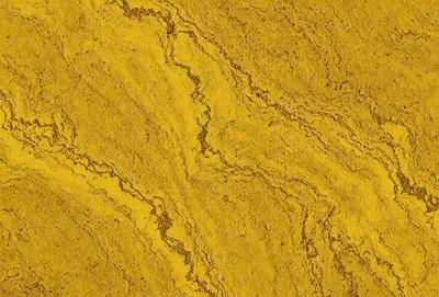 The primary subject of the image is a yellow marble surface with a pattern of swirls. The setting is a close-up of the marble, showcasing its unique texture and design. The visual style is a realistic representation of the marble, capturing its natural beauty. The colors and mood of the image are warm and inviting, with the yellow marble creating a sense of luxury and sophistication.