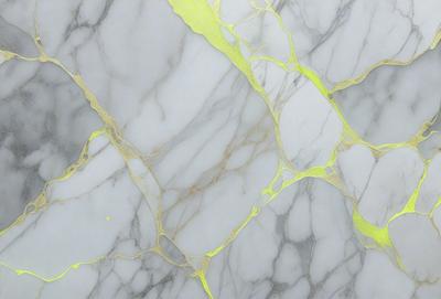The primary subject of the image is a marble wall with a yellowish tint. The setting is a room with a white marble surface. The visual style is a close-up of the marble wall, showcasing its texture and color. The dominant colors are yellow and white, creating a warm and elegant atmosphere.