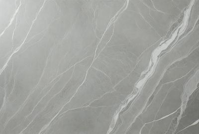 The image features a large, gray marble slab with a pattern of white and gray stripes. The marble slab appears to be a part of a countertop or a wall, and it is the primary subject of the image. The setting is a room with a gray background, which complements the marble slab. The visual style is a close-up of the marble slab, showcasing its intricate pattern. The colors and mood of the image are predominantly gray, giving it a soph