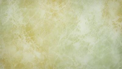 The primary subject of the image is a yellow wall with a greenish tint. The setting is a room with a yellow and green wallpaper. The visual style is a close-up of the wallpaper, showcasing the intricate design. The dominant colors are yellow and green, creating a warm and inviting atmosphere.