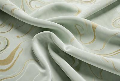 The primary subject of the image is a white sheet of fabric, which is the main object, scene, or focus of the image. The setting or background is a white table, and the visual style is a photo. The colors and mood of the image are predominantly white, giving it a clean and minimalist appearance.