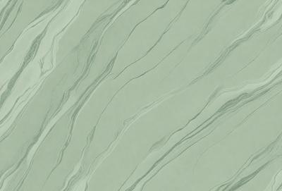The primary subject of the image is a close-up of a green marble wall. The setting is a room with a marble wall, and the visual style is a photo. The dominant colors are green and white, creating a calm and serene atmosphere.
