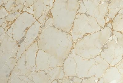 The primary subject of the image is a marble wall with a white and gold color scheme. The setting is a room with a white marble floor. The visual style is a close-up of the marble wall, showcasing its texture and patterns. The colors and mood of the image are elegant and sophisticated, with the white marble providing a clean and refined appearance.