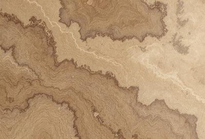The primary subject of the image is a close-up of a wooden surface, possibly a table or a piece of wood. The setting is a room with a wooden floor, and the visual style appears to be a photo of the wooden surface. The colors and mood of the image are warm and natural, with the wooden surface being the main focus.