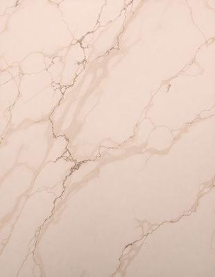 The primary subject of the image is a marble wall with a white background. The visual style is a photo, and the colors and mood are predominantly white and neutral.