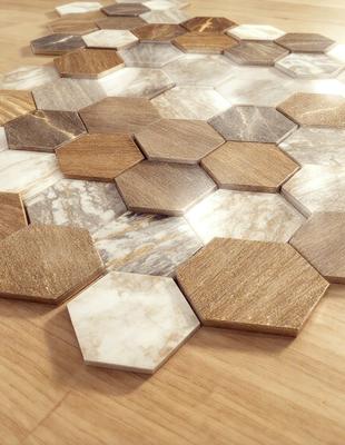 The primary subject of the image is a marble tile floor with a pattern of hexagons. The setting is a room with a wooden table, and the visual style is a photo. The colors and mood of the image are predominantly white and neutral, giving it a clean and elegant appearance.