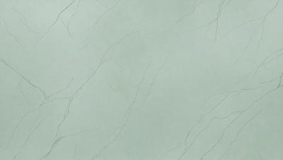 The primary subject of the image is a wall with a green tint. The setting is a room with a white surface, which creates a contrast with the green tint. The visual style is a close-up of the wall, showcasing the green tint and texture. The colors and mood of the image are predominantly green, giving it a calm and soothing atmosphere.