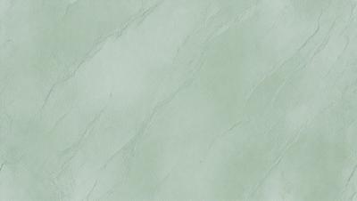 The primary subject of the image is a green marble wall. The setting is a room with a white background. The visual style is a photo of the marble wall. The dominant colors are green and white, creating a calm and serene atmosphere.