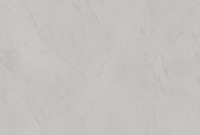 The primary subject of the image is a white marble wall. The setting is a room with a white marble wall as the main focus. The visual style is a photo of the marble wall. The colors and mood of the image are predominantly white, giving it a clean and elegant appearance.