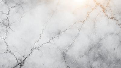 The primary subject of the image is a marble surface with a white background. The visual style is a photo, and the colors and mood are predominantly white and neutral.
