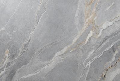 The primary subject of the image is a marble countertop with a unique, swirling pattern. The setting is a kitchen or bathroom, as the countertop is a prominent feature in the scene. The visual style is a close-up of the marble countertop, showcasing its intricate design. The colors and mood of the image are predominantly neutral, with the marble countertop being the main focus and source of visual interest.