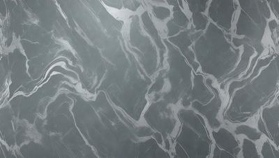 The primary subject of the image is a marble-like surface with a patterned texture. The setting is a gray background, which complements the marble-like surface. The visual style is a close-up of the marble-like surface, showcasing its intricate pattern. The colors and mood of the image are predominantly gray, giving it a sophisticated and elegant appearance.