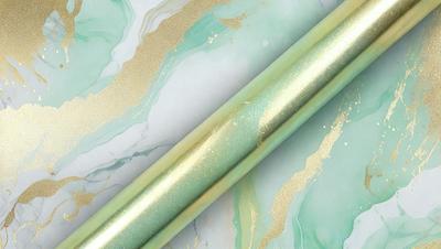 The primary subject of the image is a pair of gold-colored pens. They are placed on a marble table, which serves as the setting and background of the scene. The pens are positioned next to each other, creating a sense of symmetry and balance. The visual style of the image is a close-up of the pens, emphasizing their gold color and texture. The overall atmosphere of the image is elegant and sophisticated, with the marble table and gold pens contributing to this mood.