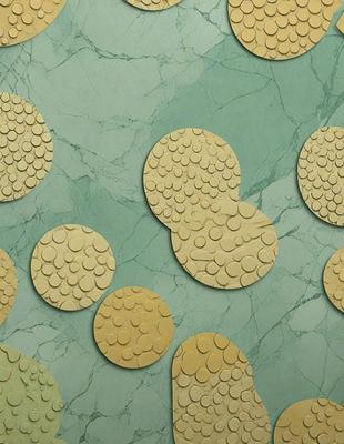The primary subject of the image is a collection of gold circles, which are arranged on a green marble surface. The setting appears to be a patterned wall, and the visual style is a combination of photo and digital art. The dominant colors in the image are green and gold, creating a warm and inviting atmosphere.