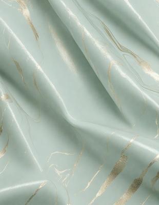 The primary subject of the image is a piece of fabric, which appears to be a blue and gold patterned material. The setting is a close-up view of the fabric, showcasing its intricate design. The visual style is a combination of a photo and digital art, as the fabric appears to be a blend of both. The colors and mood of the image are predominantly blue and gold, creating a sense of luxury and elegance.