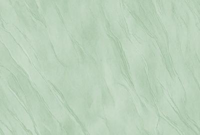 The image features a green, textured wall with a patterned texture. The primary subject is the wall, which is the main focus of the image. The setting is indoors, with the wall being the primary background. The visual style is a close-up of the wall, showcasing its unique texture and pattern. The colors and mood of the image are predominantly green, giving it a calm and soothing atmosphere.