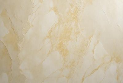 The primary subject of the image is a wall with a marble texture. The setting is a room with a white background. The visual style is a close-up of the marble wall, showcasing its texture and details. The colors and mood of the image are predominantly neutral, with the marble wall being the main focus.