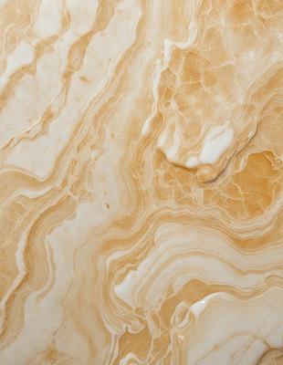 The primary subject of the image is a marble countertop with a unique, swirling pattern. The setting is a kitchen or bathroom, as the countertop is a prominent feature in the scene. The visual style is a close-up of the marble countertop, showcasing its intricate design. The colors and mood of the image are warm and inviting, with the marble countertop serving as a focal point in the space.