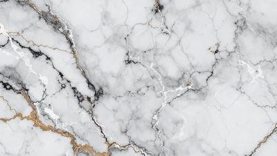 The primary subject of the image is a marble wall with a white and gold pattern. The setting is a room with a white marble surface, which adds to the overall atmosphere. The visual style is a close-up of the marble wall, showcasing its intricate design. The colors and mood of the image are predominantly white and gold, giving it a luxurious and elegant appearance.