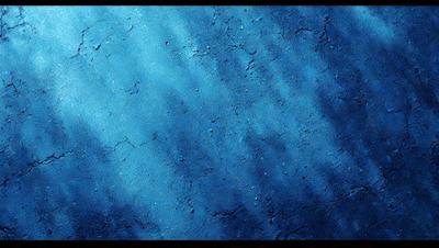 The primary subject of the image is a blue surface, possibly a wall or a piece of artwork. The setting or background is a blue-green ocean, creating a contrasting and visually appealing scene. The visual style of the image is a combination of digital art and illustration, giving it a unique and artistic appearance. The dominant colors in the image are blue and green, creating a serene and calming atmosphere.