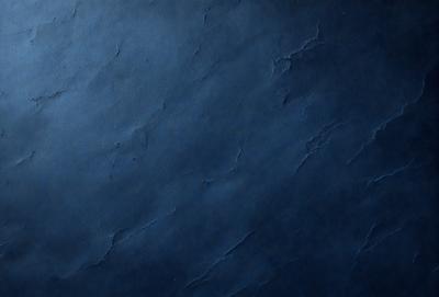 The primary subject of the image is a blue wall with a textured surface. The setting is a room with a blue background. The visual style is a close-up of the blue wall, which gives a sense of depth and texture. The dominant colors are blue and white, creating a calm and serene atmosphere.