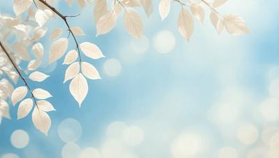 The primary subject of the image is a tree with white leaves, which is the main focus of the scene. The tree is surrounded by a blue sky, creating a serene and peaceful atmosphere. The visual style of the image is a photo, capturing the natural beauty of the tree and its surroundings. The colors in the image are predominantly blue and white, which contribute to the calming and tranquil mood of the scene.