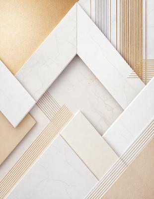 The primary subject of the image is a white marble tile. The setting is a white marble wall, and the visual style is a patterned design. The dominant colors are white and gold, creating a clean and elegant atmosphere.