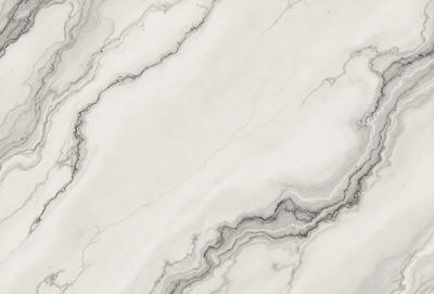 The image features a white marble surface with a pattern of swirls and grooves. The marble appears to be a natural stone, and the surface is smooth and shiny. The setting is a white marble countertop, which adds a touch of elegance and sophistication to the space. The visual style of the image is a close-up of the marble surface, highlighting the intricate patterns and textures of the stone. The colors and mood of the image are predominantly white, giving it