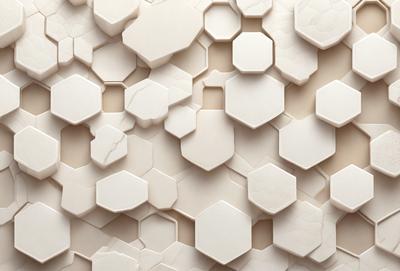 The primary subject of the image is a white marble wall with a pattern of hexagonal shapes. The setting is a room with a beige background. The visual style is a close-up of the marble wall, showcasing the intricate design of the hexagonal shapes. The colors and mood of the image are predominantly white, giving it a clean and elegant appearance.