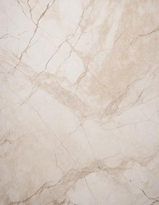 The image features a marble wall with a cream-colored texture. The wall appears to be made of marble, giving it a luxurious and elegant appearance. The marble wall is the primary subject of the image, and it is set against a backdrop of a room or a building. The visual style of the image is a close-up of the marble wall, showcasing its intricate texture and details. The colors and mood of the image are warm and inviting, with the cream-color