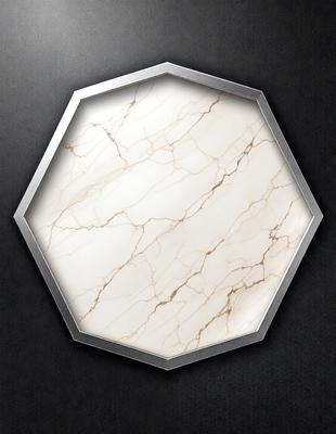 The primary subject of the image is a marble-like surface, which appears to be a square or hexagonal shape. The surface is white and has a patterned texture, giving it a unique and elegant appearance. The setting is a dark background, which contrasts with the light-colored marble surface. The visual style of the image is a close-up, focusing on the intricate details of the marble pattern. The colors and mood of the image are predominantly dark and moody, with the white