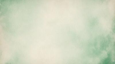 The primary subject of the image is a white wall with a green tint. The setting is a room with a green background. The visual style is a close-up of the wall, which gives a sense of depth and texture. The colors and mood of the image are predominantly green, creating a calm and serene atmosphere.