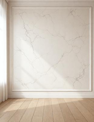 The primary subject of the image is a large, white marble wall with a patterned texture. The setting is a room with a wooden floor, and the visual style is a photo. The dominant colors are white and gray, creating a clean and elegant atmosphere.