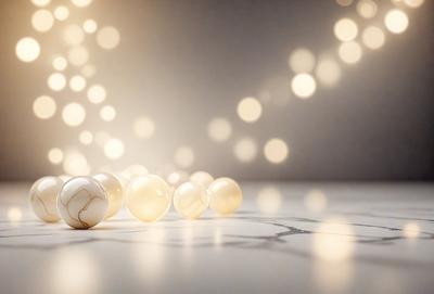 The primary subject of the image is a group of six white balls arranged in a circle on a white surface. The setting appears to be a white room with a patterned floor. The visual style of the image is a combination of photo and digital art, creating a unique and eye-catching display. The colors and mood of the image are predominantly white, giving it a clean and minimalist appearance.