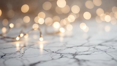 The primary subject of the image is a close-up of a string of lights, which are illuminated and creating a beautiful pattern on the surface. The setting is a white background, which provides a clean and minimalistic appearance. The visual style is a combination of a photo and digital art, as the lights are captured in a realistic manner while the overall composition and pattern are created digitally. The colors and mood of the image are predominantly white, with the lights adding a touch of warmth and brightness to the scene