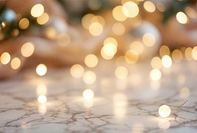 The primary subject of the image is a close-up of a white table with a patterned surface. The setting is a room with a white tablecloth, and the visual style is a photo. The colors and mood of the image are predominantly white, creating a clean and serene atmosphere.