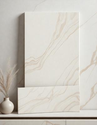 The primary subject of the image is a marble-patterned wall, which is the main focus of the scene. The setting is a room with a white wall, and the visual style is a photo. The colors and mood of the image are predominantly white, giving it a clean and elegant appearance.